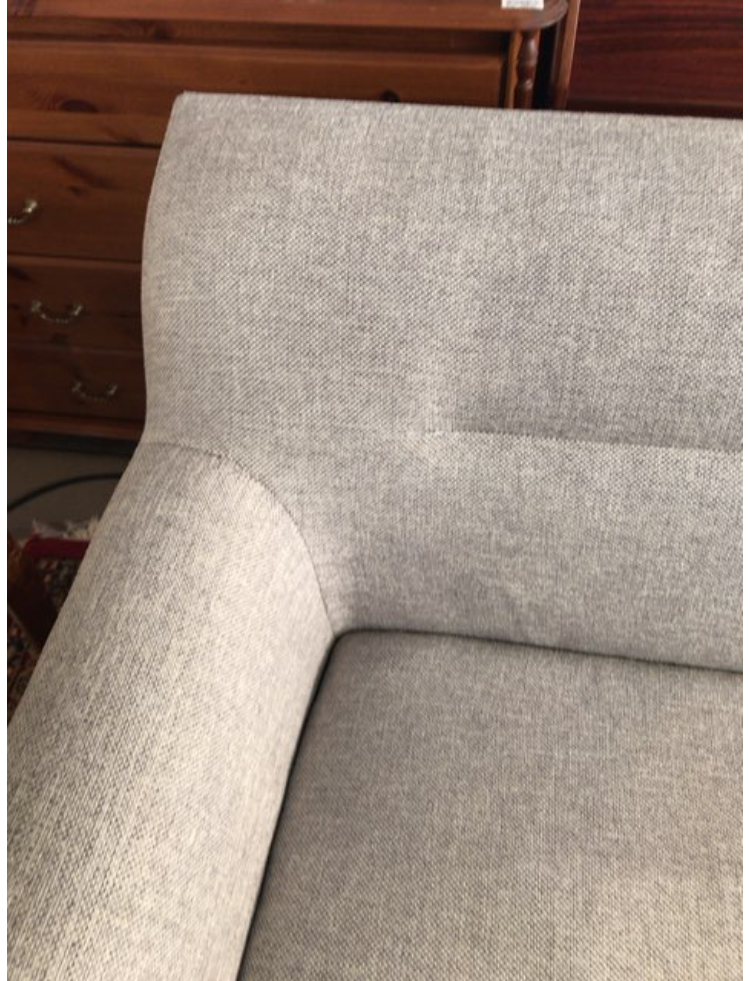 Sofa med grå polster